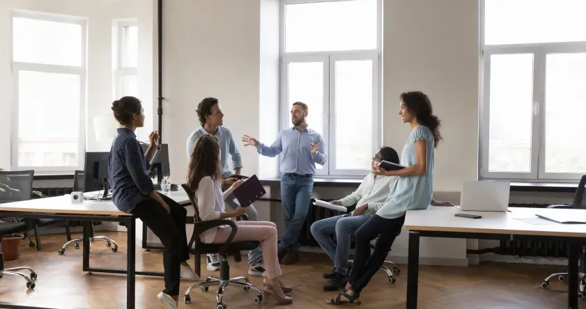 ServiceNow professionals collaborating in an office